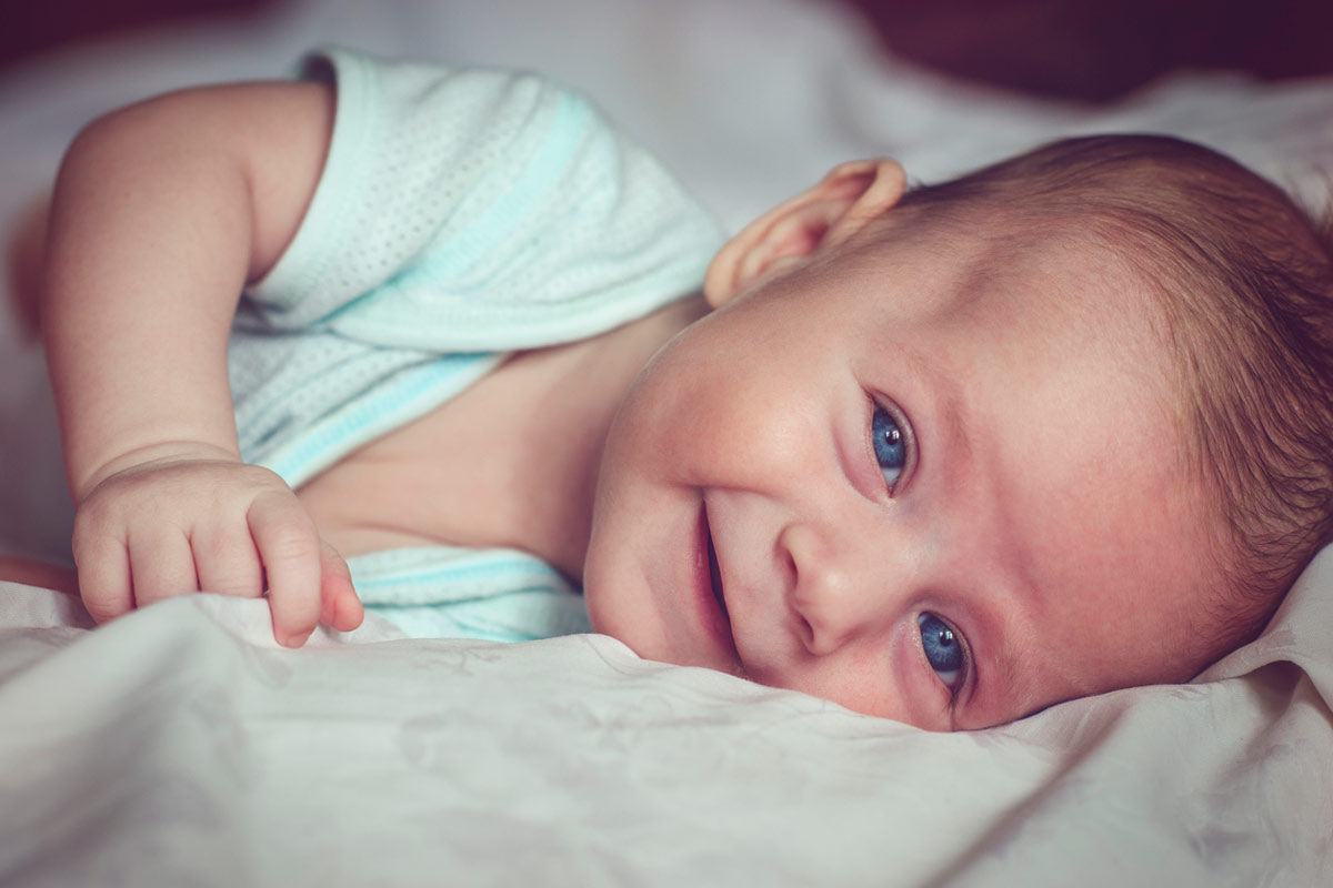 newborn baby with blue eyes