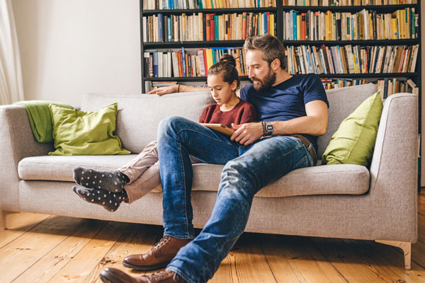 dad monitoring daughter's social media use