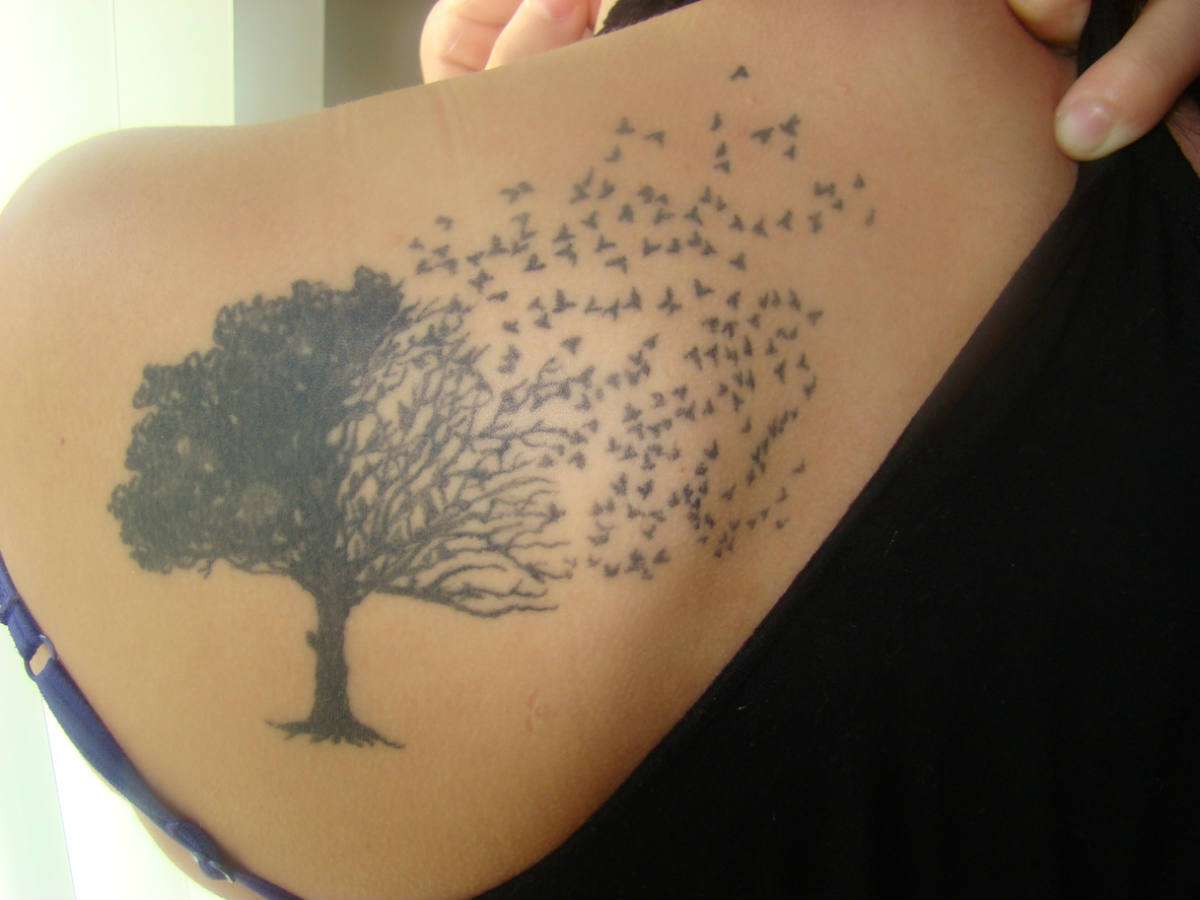 broken family tree tattoo